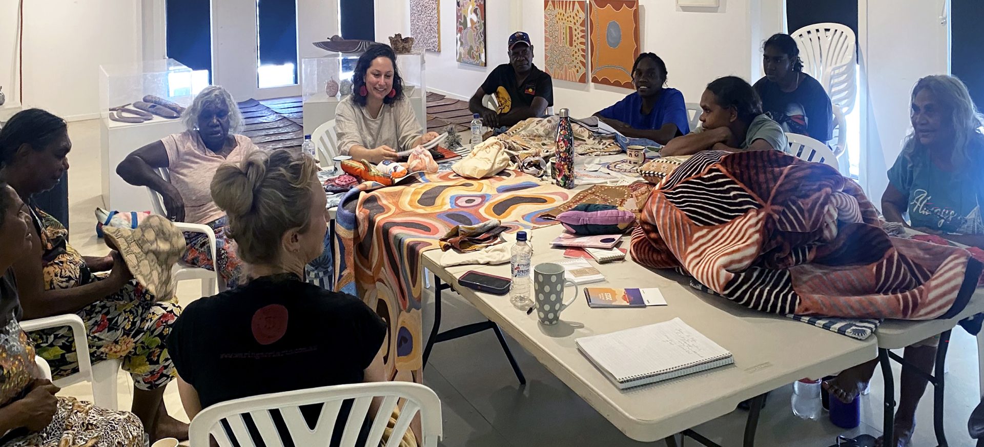 Consultant Sharmila Wood from Tarruru with artists at Waringarri Aboriginal Arts, Kununurra, 2023. 