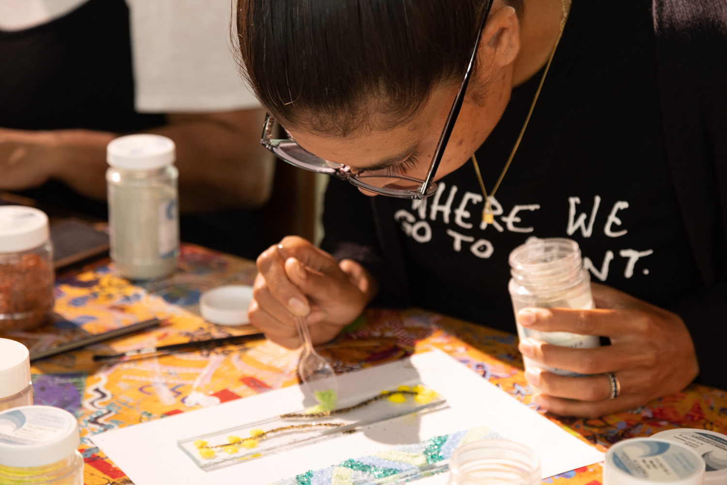 Ruby Alderton making glass message sticks at Dandjoo Darbalung (UWA), March 2024. Photograph by Balthazaar Media. 