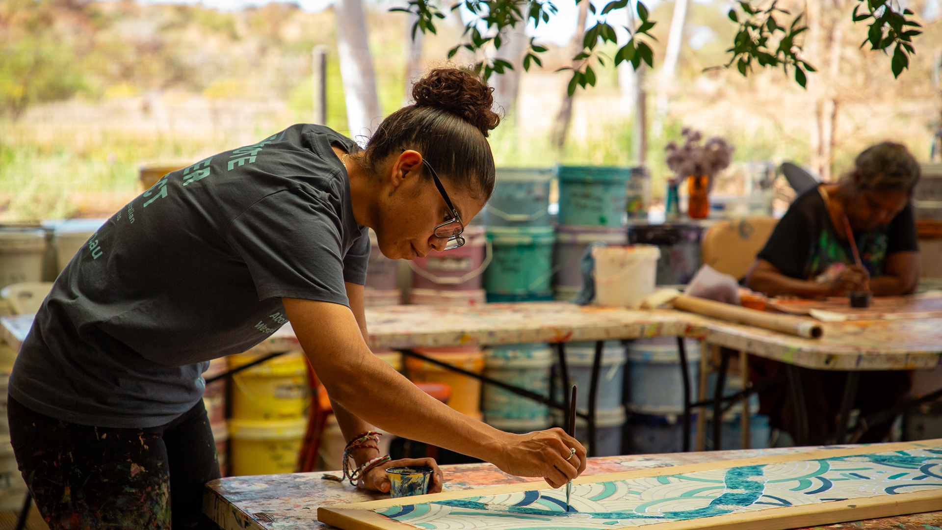 Ruby Djikarra Alderton silk painting, Our Future: Aboriginal Arts Worker Training Program at Martumili Artists, Nyiyaparli Country (Newman). Photograph by Jessica Russell.